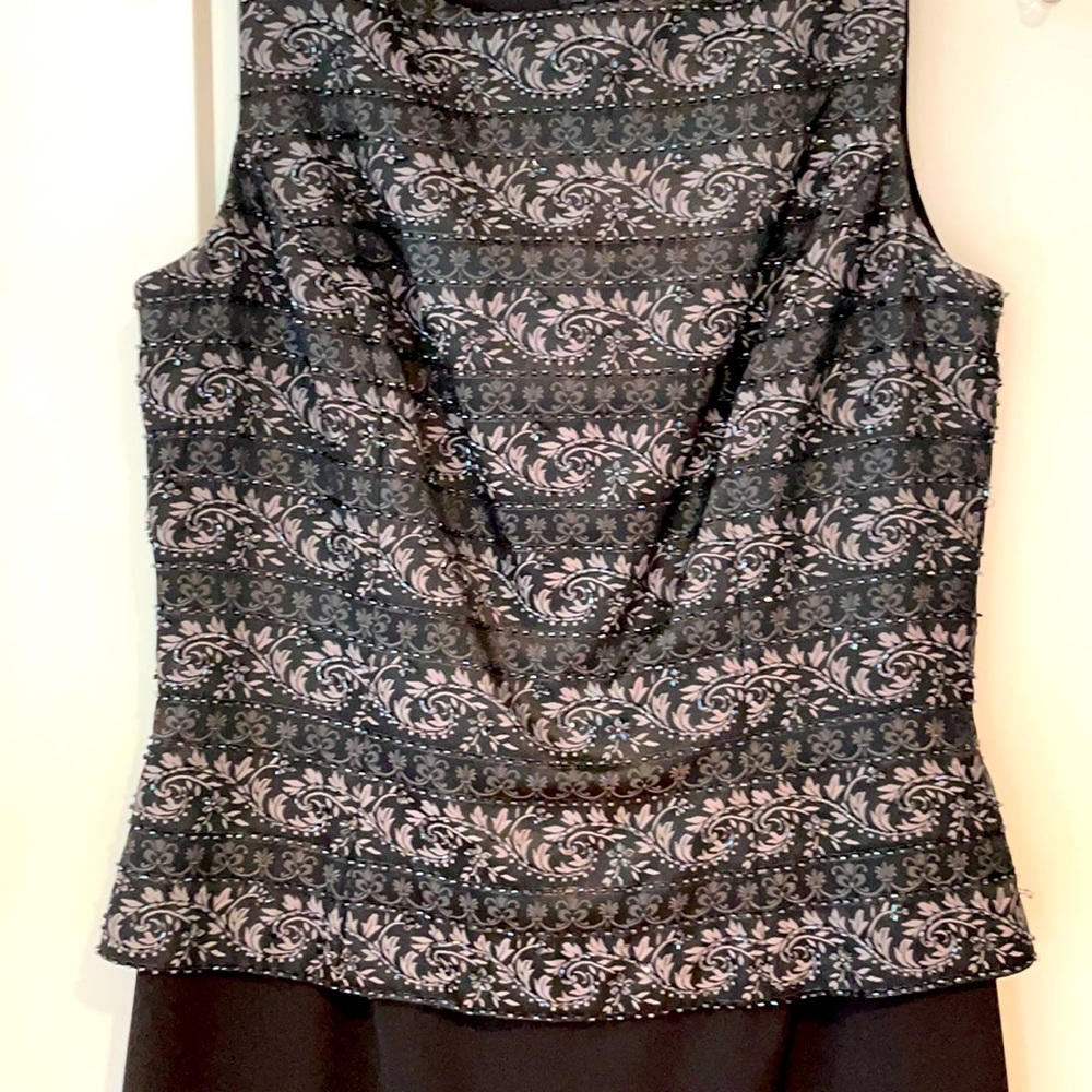 Formal, long black one-piece dress with flair!